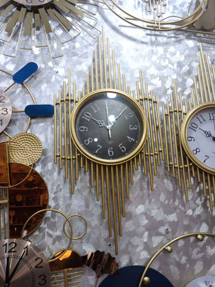 Punode Wall clock image - Mobimarket